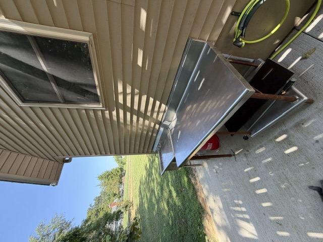 Outdoor stainless-steel fish-cleaning table