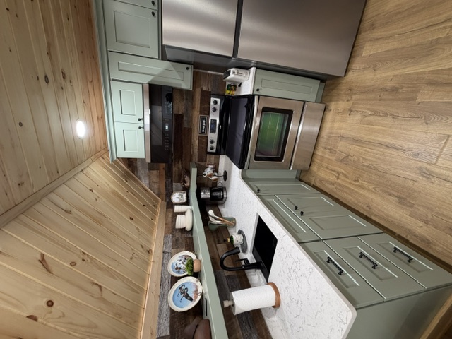 Full kitchen with refrigerator, range, sink, and coffee maker