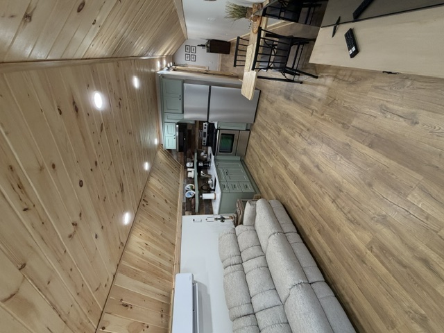Blue Springs Loft living area, kitchen, and dining space